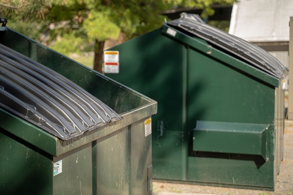 commercial dumpsters have restrictions on hazardous materials, liquids, and other prohibited items